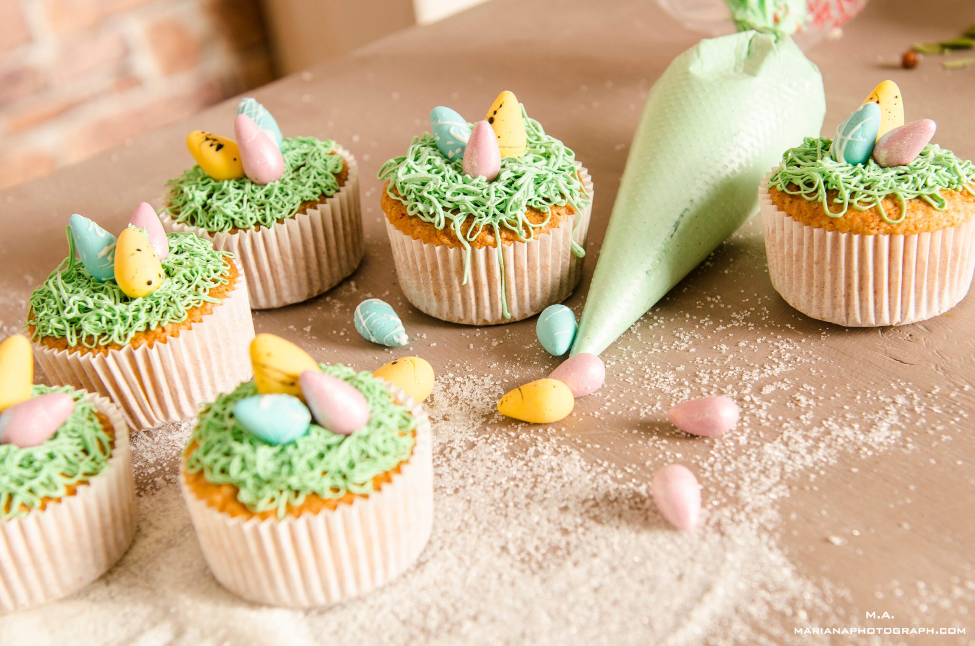 easter cupcakes on wooden background a close up of a decorated cake on a table