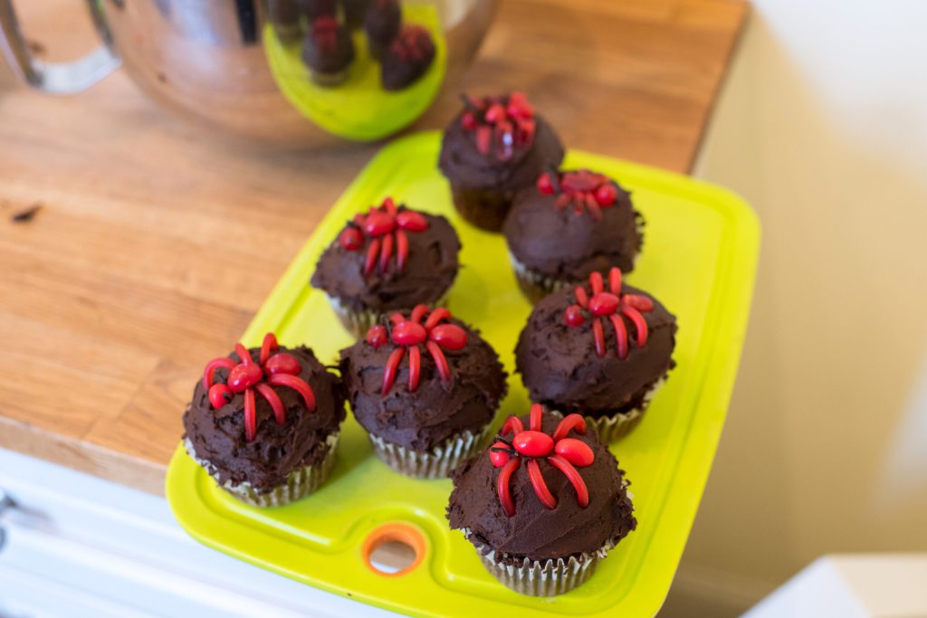 a birthday cake sitting on top of a wooden table