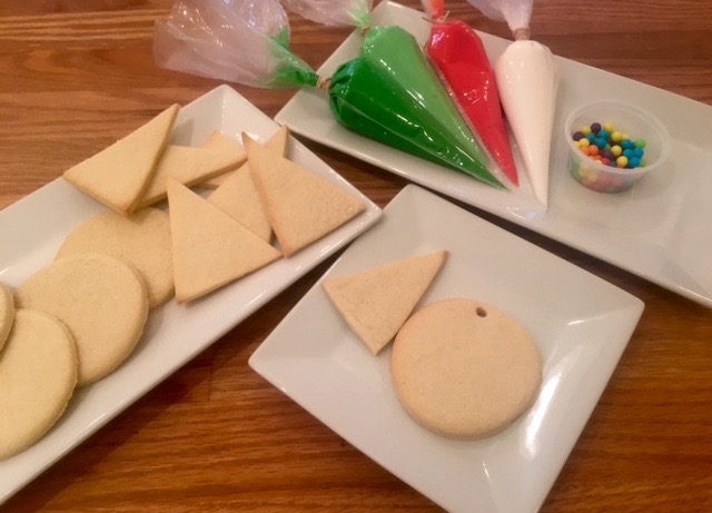 icing baked sugar cookie triangles and circles