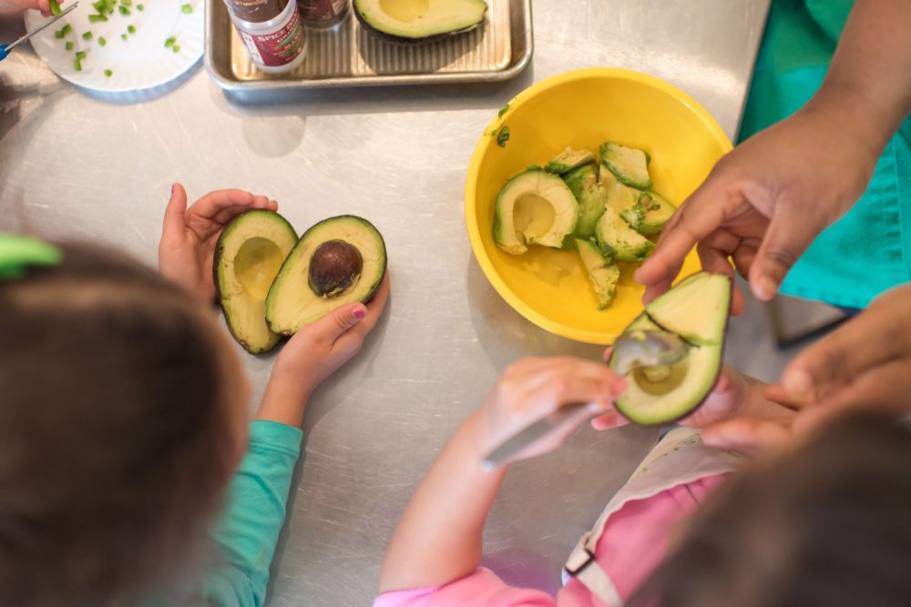 fresh avocado slices in a bowl