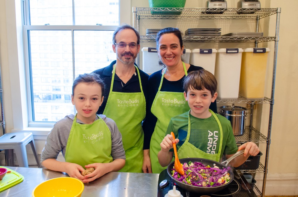 family with a colorful salad