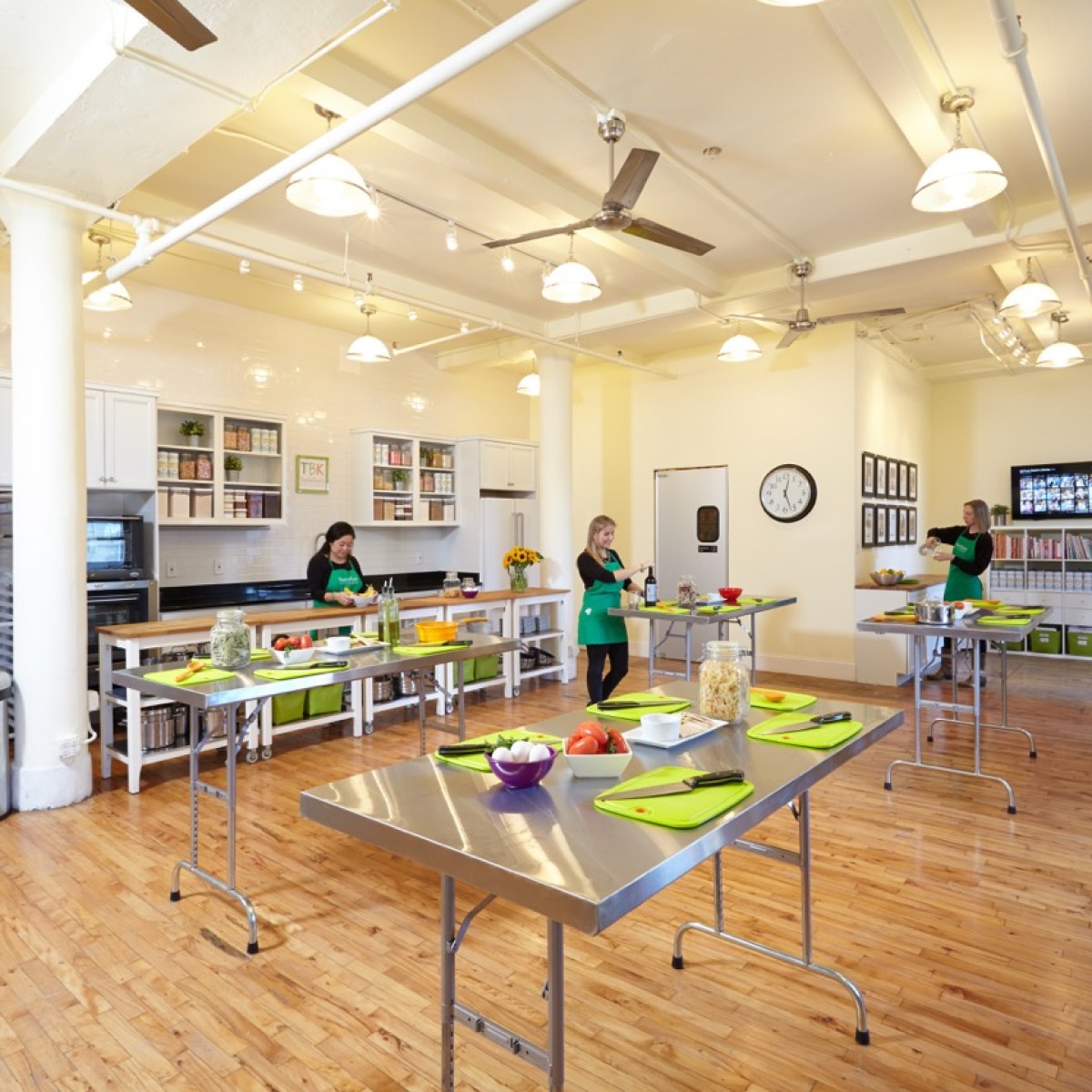 a kitchen with a table in a room