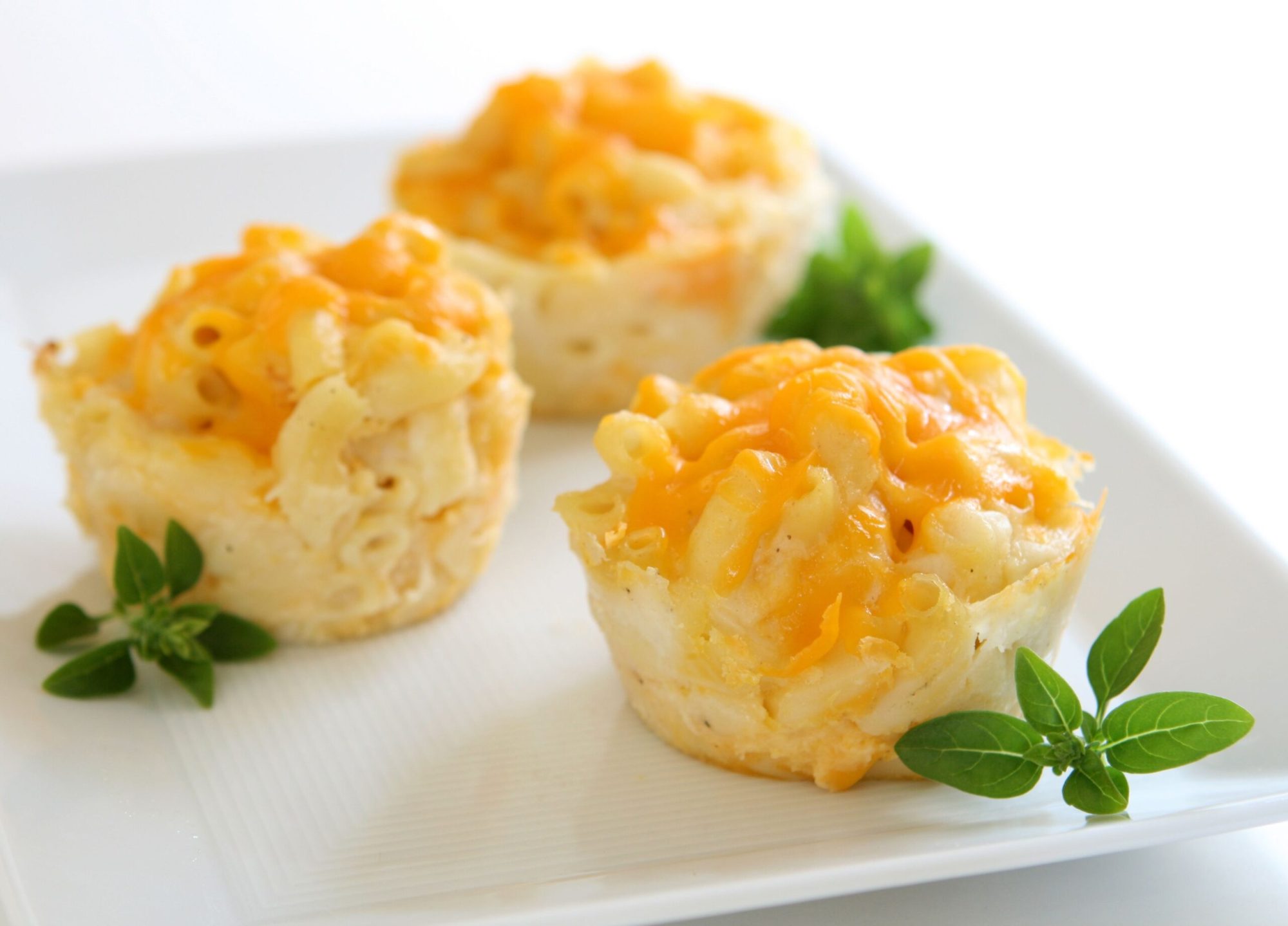 Taste-Buds-Kitchen-Mac-n-Cheese a plate of food with broccoli