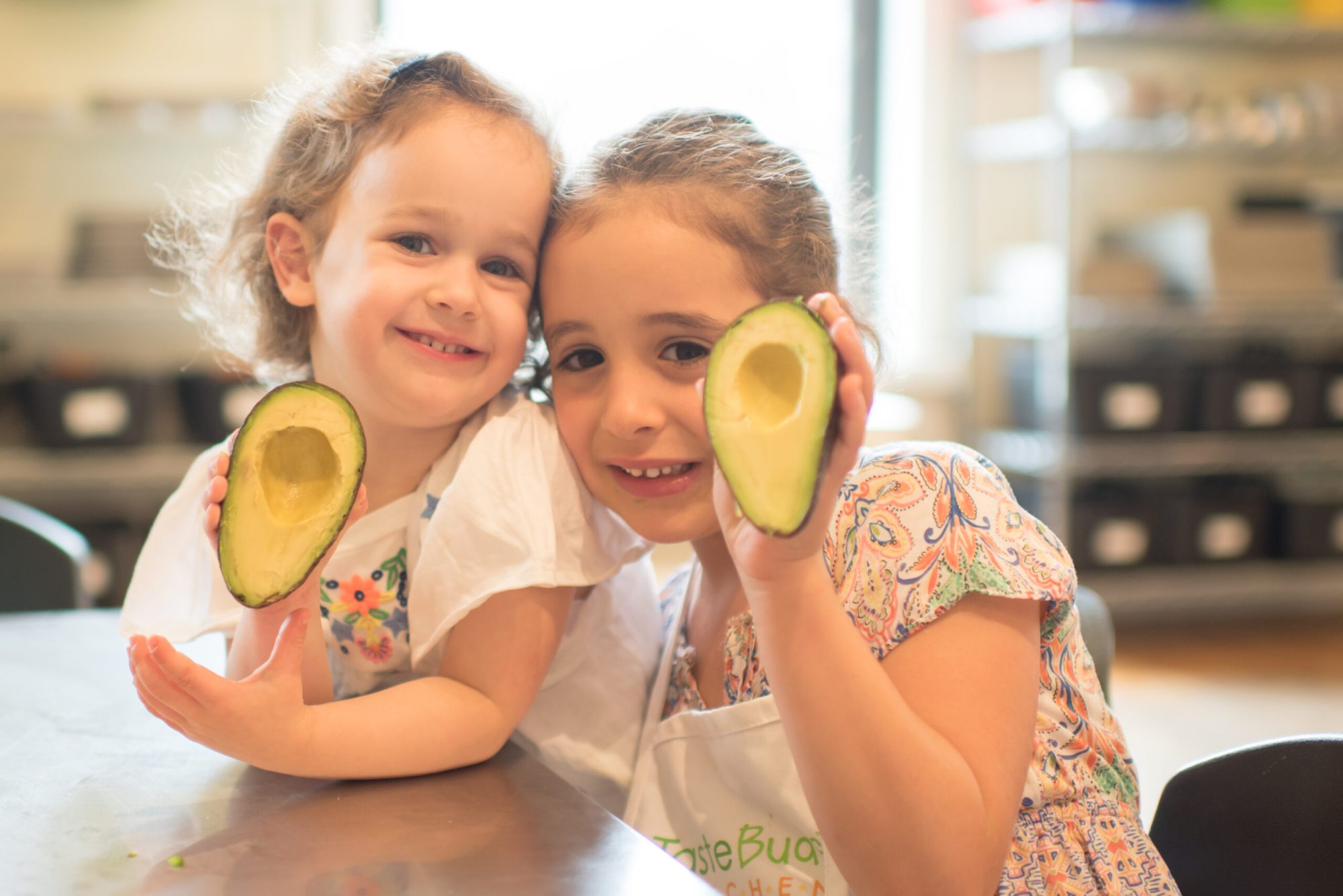 TBK_Kids_Jun18-154-1 (1) two girls holding avocados