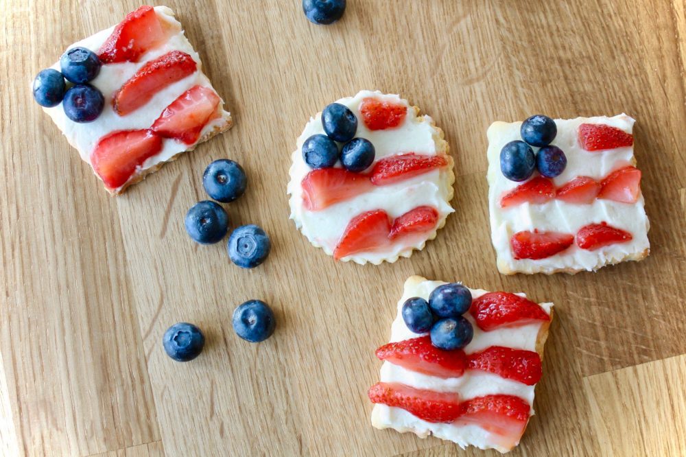 a cutting board with a cake on a table
