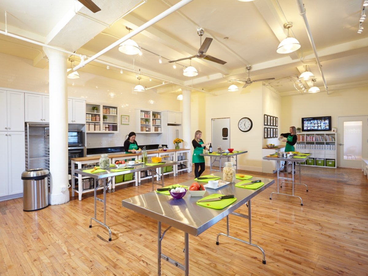 a kitchen with a table in a room