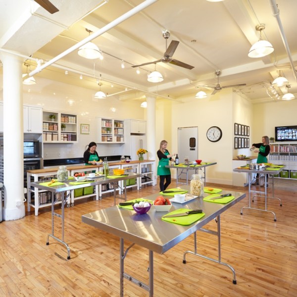 a kitchen with a table in a room