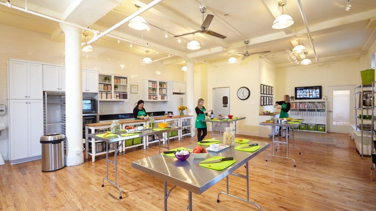 a kitchen with a table in a room