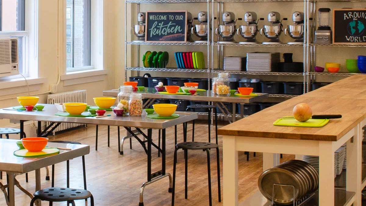 a kitchen with a table in a room