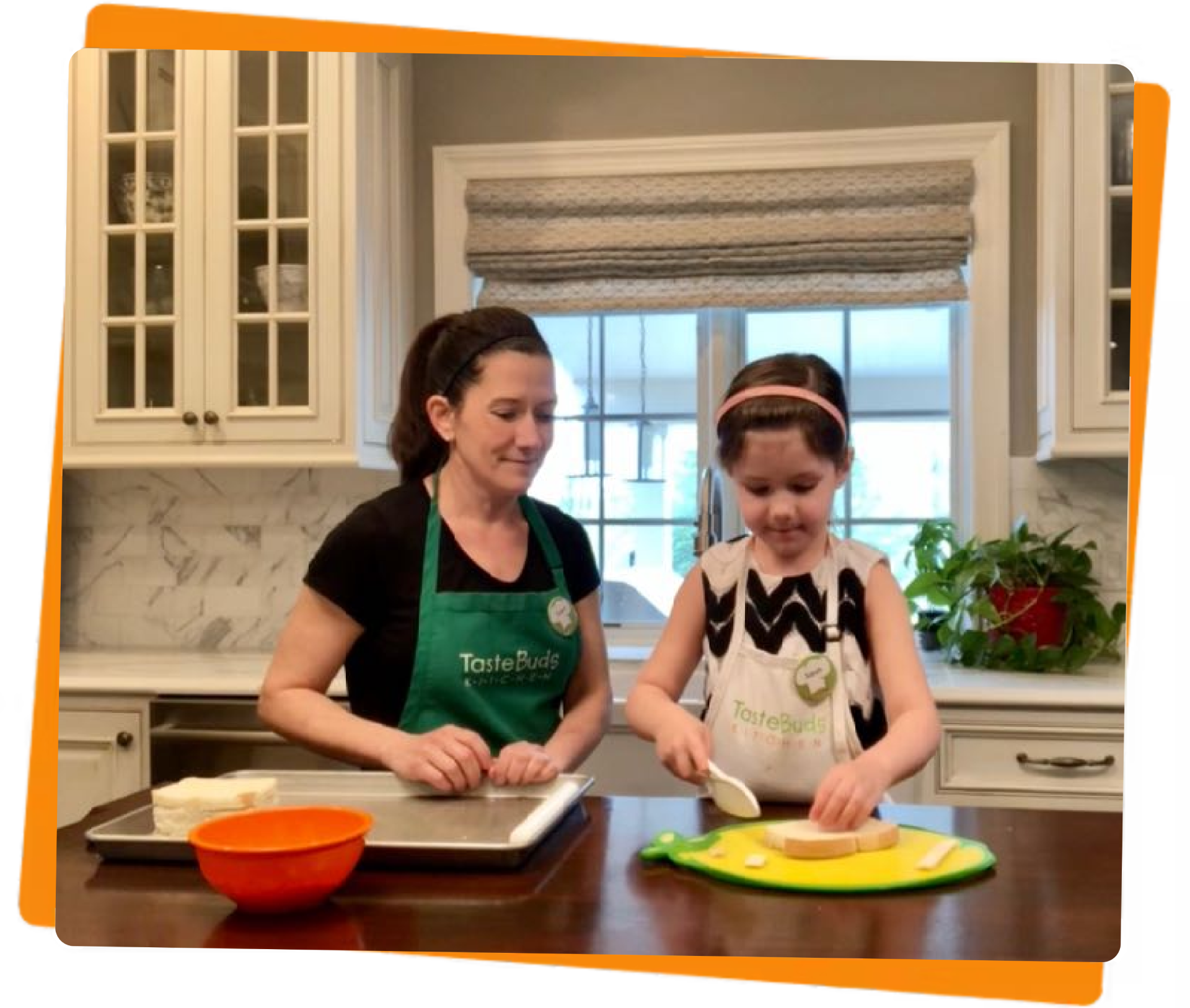 Women and daughter preparing a sandwich
