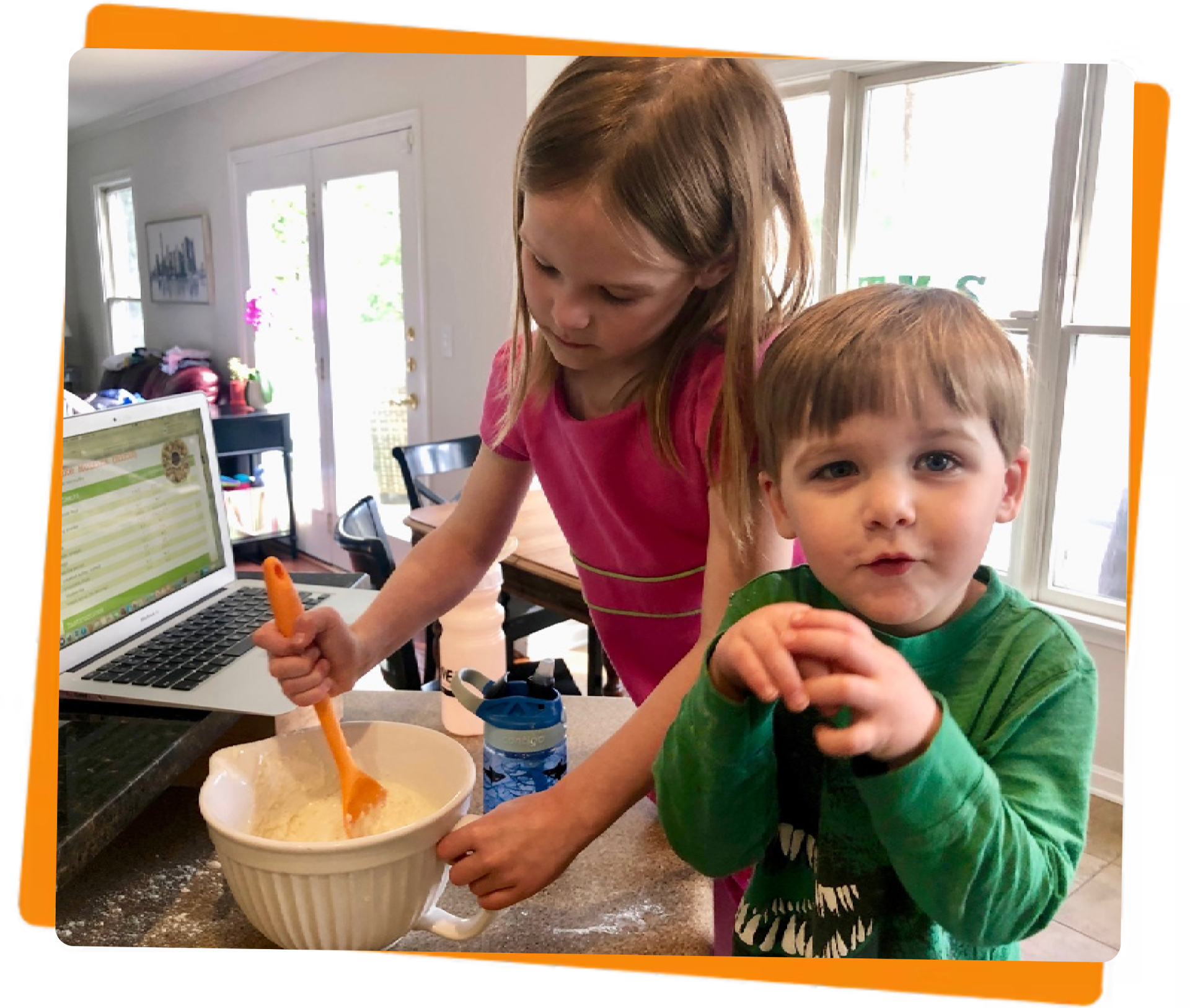 boy and girl with a mixing bowl