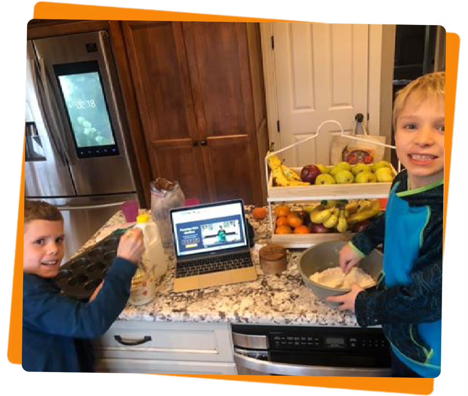 kids watching a virtual cooking class from the kitchen
