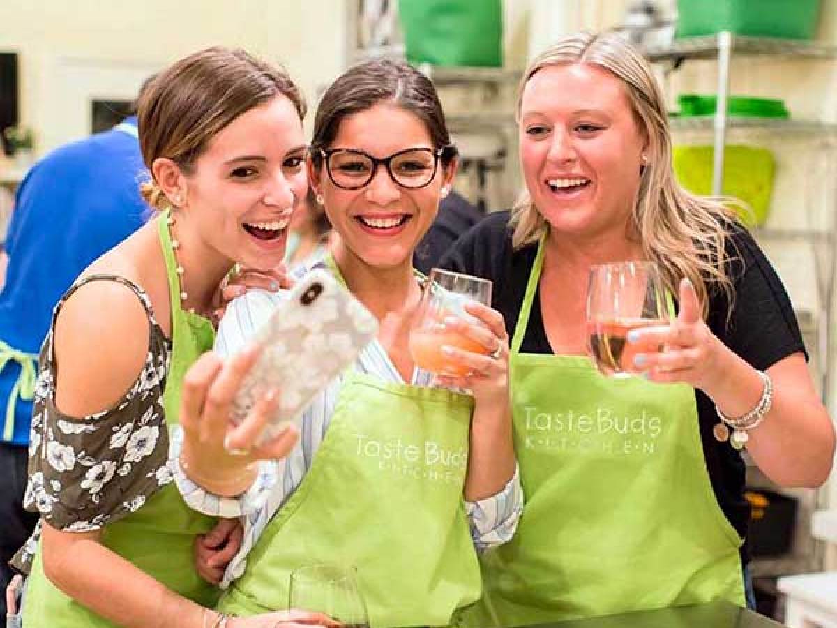 Three Women Taking a Selfie at a BYOB Cooking Class